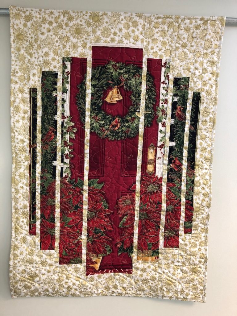 Christmas wall quilt with gold, red and green print fabric